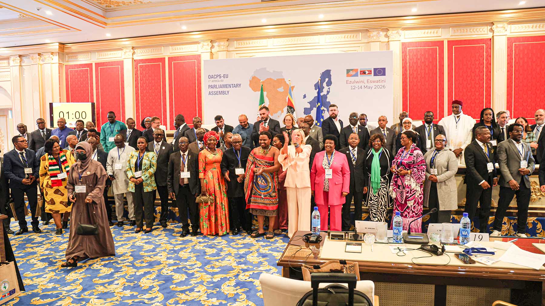 His Majesty's representative Prince Lindani (C) took pictures with members of the Joint Parliamentary Assembly after the conclusion of the OACPS-EU at Ezulwini Palazzo yesterday. 